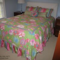floral bed spread with rose pillow